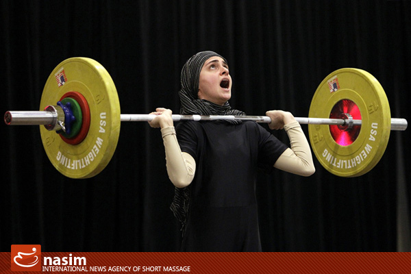 تصاویر زن مسلمان وزنه بردار آمریکایی