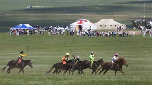 مسابقات سالانه سوارکاری Naadam که هر ساله در اولان باتور برگزار می‌شود.
REUTERS/Zeev Rozen
