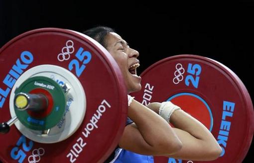 ورزشکار ماداگاسکاری در رقابت های دسته 48 کیلوگرم وزنه برداری بانوان REUTERS/Adrees Latif 
