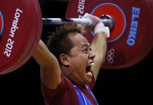 وزنه بردار اندونزیایی در گروه B رقابت های وزنه برداری دسته 56 کیلوگرم المپیک REUTERS/Kai Pfaffenbac 