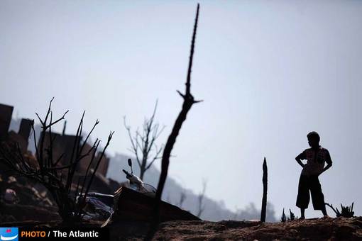 یک آواره میانماری که مجبور به ترک خانه خود شد. درگیری های مذهبی در میانمار در سال گذشته بسیاری را مجبور به ترک محل زندگی خود کرد.