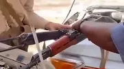 باتری به باتری خودرو با کلاشنیکف!
