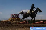 عکس: مسابقات کمانگیری روی اسب