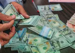 عقب‌نشینی قیمت دلار آزاد همزمان با رکوردشکنی حواله در مرکز مبادله