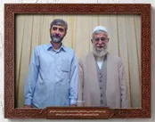 تصویری از شهید باقری در کنار رهبرشهید انقلاب