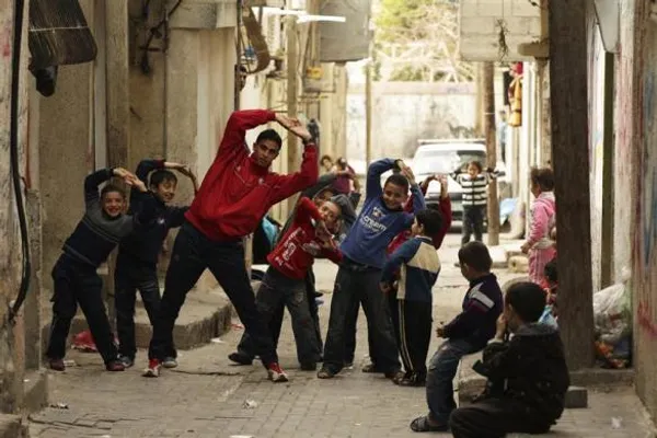 Bahaa al-Farra دونده فلسطینی، در حال تمرین برای رسیدن به المپیک در خیابان&zwnj;های غزه
City, March 25, 2012
