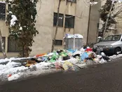 عدم جمع آوری زباله ها در روزهای برفی تهران