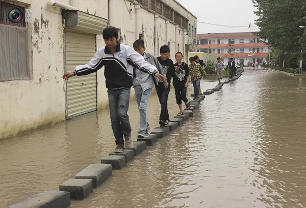 آب گرفتگی گذرگاه&zwnj;ها در شانگ&zwnj;کیو، چین
CHINA STRINGER NETWORK/REUTERS
