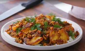 سیب‌زمینی له شده سوخاری با سس گردو